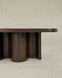 Contemporary wooden coffee table with sculptural detailing throughout. Crafted to highlight the beauty of natural timber.