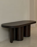 Designer coffee table featuring a solid wood construction. A luxury furniture piece for sophisticated living spaces.
