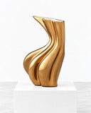Niccolo Poggi Sinuo Vase featuring a polished gold-tone finish with fluid, twisted curves and a distinctive asymmetrical opening. Its luminous surface and sculptural form create an elegant statement for contemporary residential and hospitality interiors.