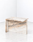 Noemi Saga The Coffee Table featuring a rectangular marble top with warm beige and grey veining, supported by matching slab legs. Its continuous stone surfaces and clean architectural form create an elegant statement for contemporary interiors.