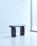 Contemporary Magma Bench handcrafted from oak and finished with polished resin. Artistic luxury seating piece with organic curves and a reflective surface.