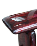 Sculptural wooden bench with flowing contours and a glossy resin coating by Onno Adriaanse. Statement collectible furniture designed for modern interiors.