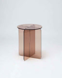 Sculptural acrylic side table with a polished translucent finish and geometric base. Crafted to add colour and contemporary elegance to living spaces.