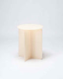 Luxury round side table made from coloured acrylic with clean architectural lines. A designer furniture piece for sophisticated contemporary interiors.