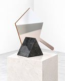 Richard Yasmine Ashkal Vanity Mirror featuring an angular, geometric mirror composition with contrasting metallic edges and a sculptural dark base. Its asymmetrical shapes and reflective surfaces create a distinctive contemporary dressing-table accent.