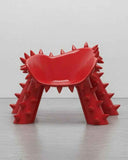 Contemporary chair showcasing sculptural geometry and architectural character. Designed to complement sophisticated residential interiors.