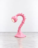 Ryan Mercer Biggest Lamp featuring a sculptural, curved pink stem with a distinctive spiked profile and an expressive oversized silhouette. Its playful form transforms functional lighting into a bold contemporary design statement.