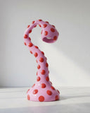Contemporary floor lamp. Designed to provide ambient lighting while creating a striking focal point in modern interiors.