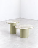SECOLO Gemini Geometric Coffee Table featuring sculptural cylindrical bases and round stone tops with distinctive natural veining. Its contrasting geometric forms bring a refined, contemporary accent to luxury living spaces.