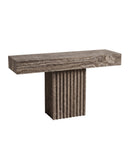 Contemporary THERRA console featuring a natural travertine top and fluted stone pedestal with pronounced vertical texture. Its architectural silhouette creates a refined statement piece for modern interiors.