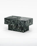 Contemporary THERRA side table crafted from dark green veined stone with a compact rectangular silhouette and solid pedestal support. The sculptural design combines natural material with bold architectural geometry.