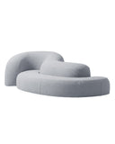 Sculptural TRACE ISLAND sofa featuring low-profile curved modules and softly upholstered forms arranged in an organic composition. Its fluid silhouette creates a distinctive contemporary centerpiece for expansive interiors.