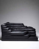 Left-angle view of the DS-1025 Terrazza designer sofa showcasing its iconic terraced silhouette and luxurious leather finish. Crafted to combine comfort with collectible design.
