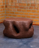 Luxury coffee table with a monolithic handcrafted form. Crafted for contemporary collectible interiors.