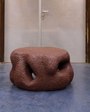 Contemporary sculptural coffee table with organic detailing. A statement piece for sophisticated living spaces.