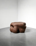 Designer coffee table with expressive organic contours and texture. Created to celebrate materiality and craftsmanship.