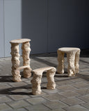 Sculptural stools collection featuring handcrafted organic forms. A collectible furniture series inspired by contemporary artisan design.