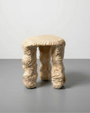 Contemporary stool with a textured handcrafted finish and solid timber seat. Crafted as a statement piece for modern interiors.
