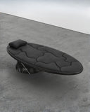 Troy Smith Off Balance Daybed featuring a sculptural black upholstered surface with organic tufted forms. A statement daybed for contemporary luxury interiors.