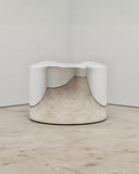 Troy Smith Pill Chair featuring a rounded sculptural silhouette and reflective metal finish. Its bold form creates a striking accent for contemporary spaces.