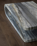 Marble-patterned stone slab on a wooden floor