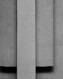 Close-up of gray concrete blocks with a textured surface