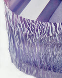 Contemporary raw crystal furniture piece standing on white background