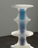 Tall frosted acrylic sculpture with undulating shape and blue gradient