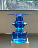 Close up of translucent indigo resin showing light refraction and depth