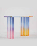 Close up of translucent resin leg transitioning from blue to pink magenta