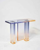 Rectangular acrylic console table fading from lavender blue to amber orange